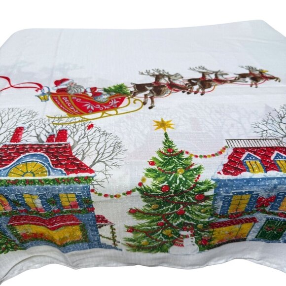 Benson Mills Christmas Village Tablecloth with Santa and Sleigh 57x102 Obong - Picture 1 of 9